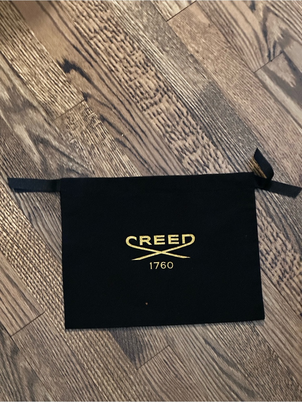 Creed Black Drawstring Pouch with Gold Logo